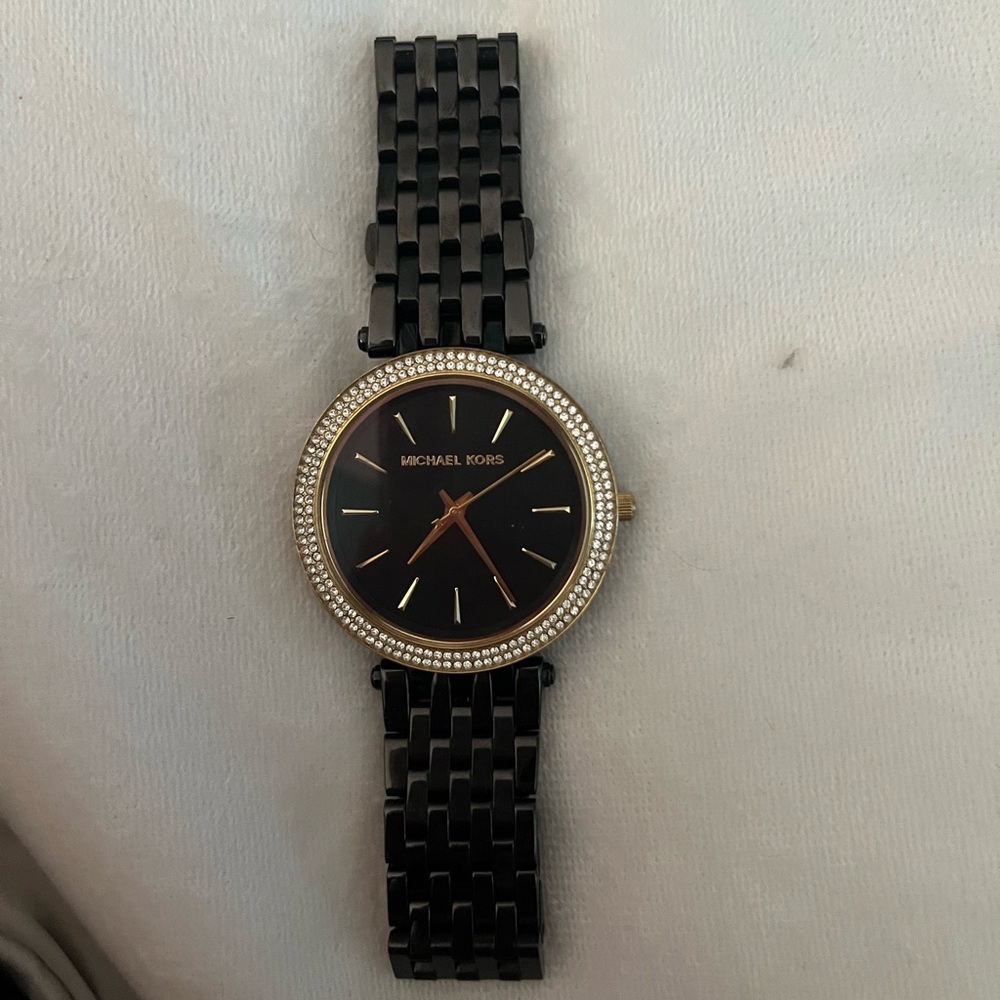 Black and gold Michael Kors watch